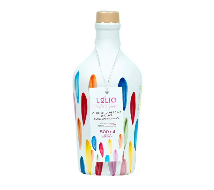 A 500 ml bottle of L'olio extra vergine d'ulivo olive oil, decorated with colorful paint strokes in red, blue, yellow, orange, and pink on a white background. The bottle has a natural cork stopper and a hanging paper label.