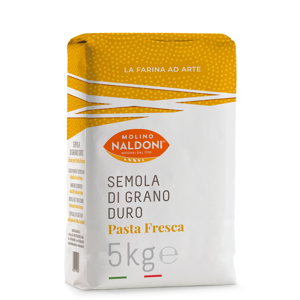 A 5kg bag of Molino Naldoni Semola di Grano Duro (hard wheat flour) with a white and yellow design, photographed on a clean white background.