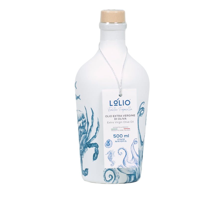 A 500 ml bottle of L’olio Extra Virgin Olive Oil, featuring a white bottle with blue sea creature illustrations and a cork stopper, on a white background.