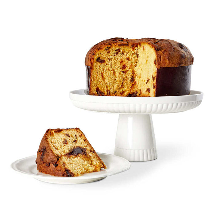Acetaia Malpighi Panettone Cake with Balsamic on a white cake plate.
