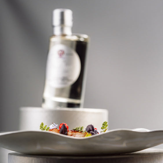 acetaia malpighi white dressing with a plate of food