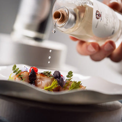 acetaia malpighi white dressing pouring over food