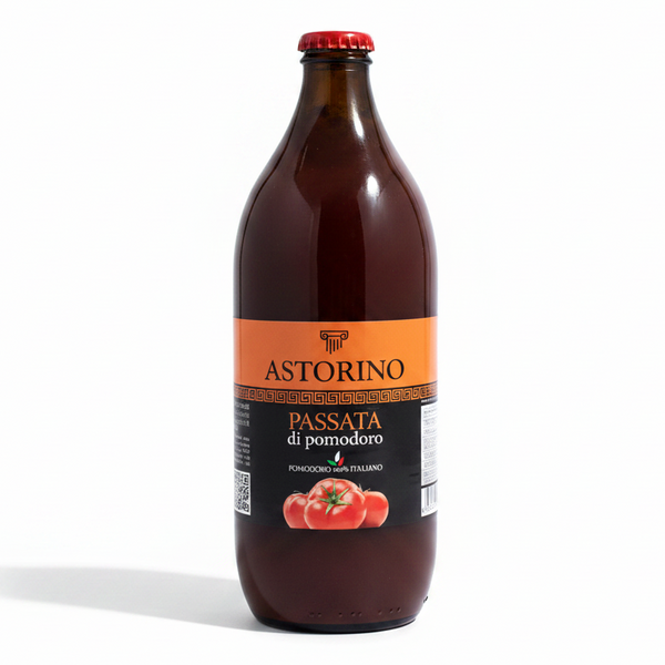 A bottle of Astorino Passata di Pomodoro, featuring a dark brown glass bottle with a red cap and a label that has orange and black sections with a tomato graphic, set against a plain white background.