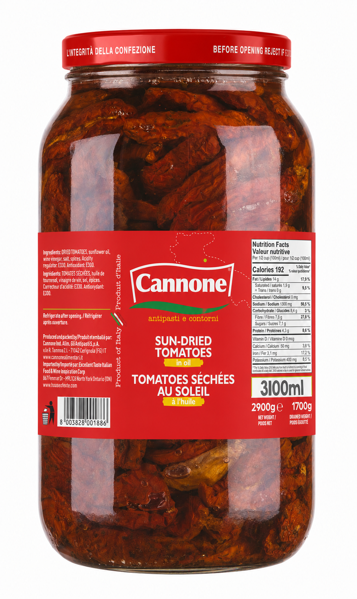 A large glass jar of Cannone sun-dried tomatoes, showing the dark red dried tomatoes inside and a red label with white and yellow text.